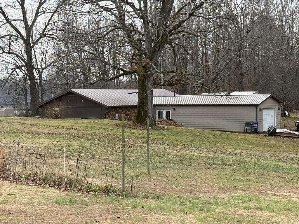 2 Acres of Land with Home for Sale in Camden, Tennessee