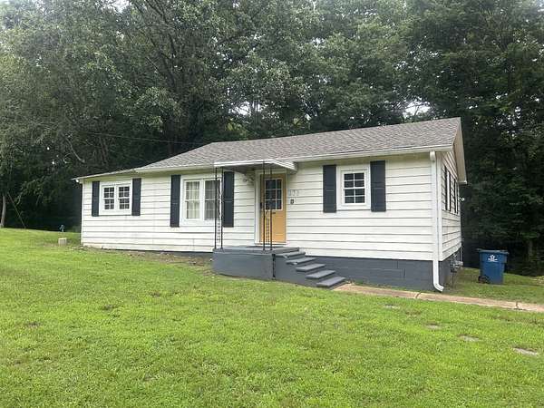 2 Acres of Residential Land with Home for Sale in Camden, Tennessee