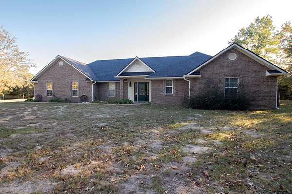 4.37 Acres of Land with Home for Sale in Holly Lake Ranch, Texas