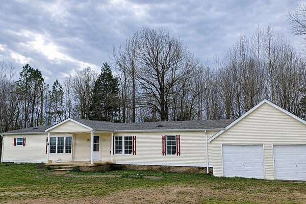 2 Acres of Residential Land with Home for Sale in Big Sandy, Tennessee