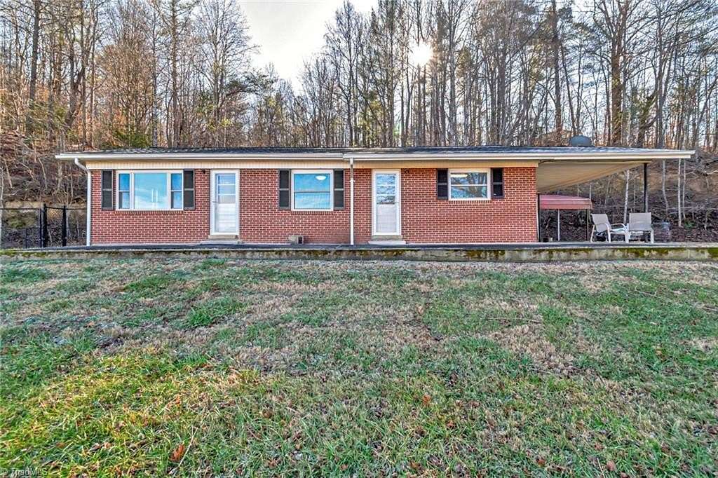 9.1 Acres of Residential Land with Home for Sale in Moravian Falls, North Carolina