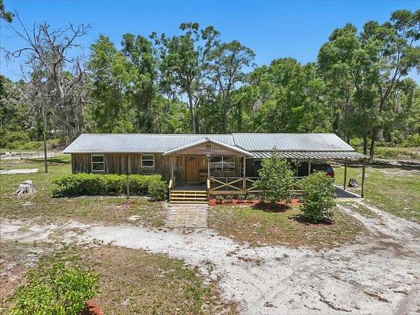 5 Acres of Residential Land with Home for Sale in Old Town, Florida