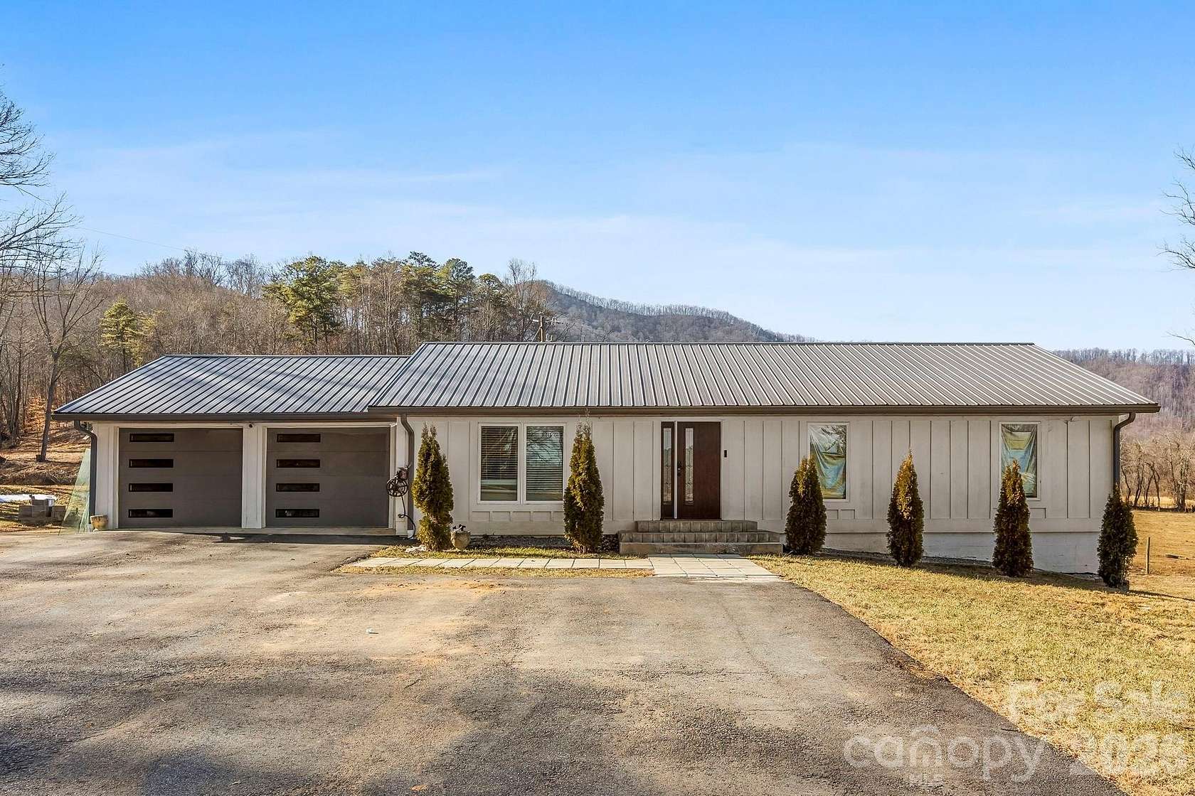 49.8 Acres of Land with Home for Sale in Candler, North Carolina