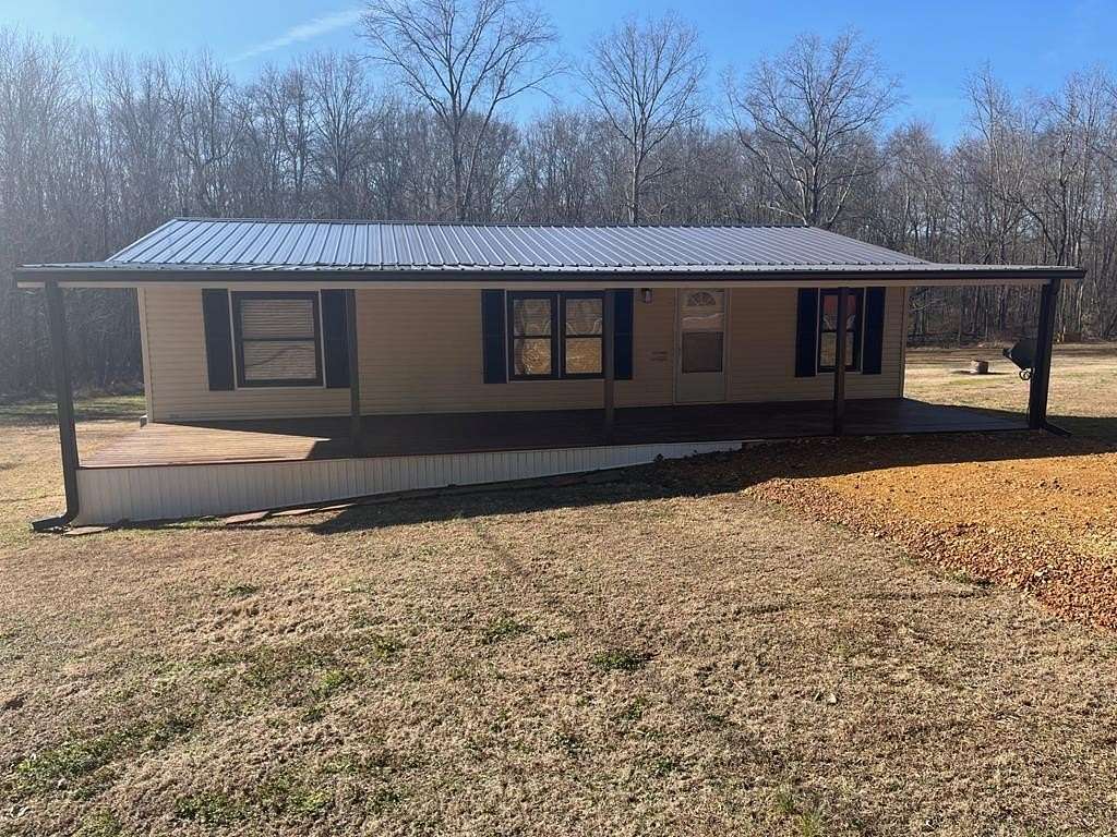 10.6 Acres of Land with Home for Sale in Buchanan, Tennessee