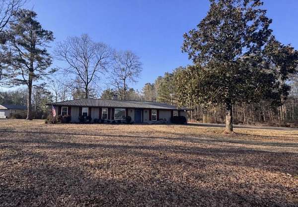 6.2 Acres of Residential Land with Home for Sale in Tupelo, Mississippi