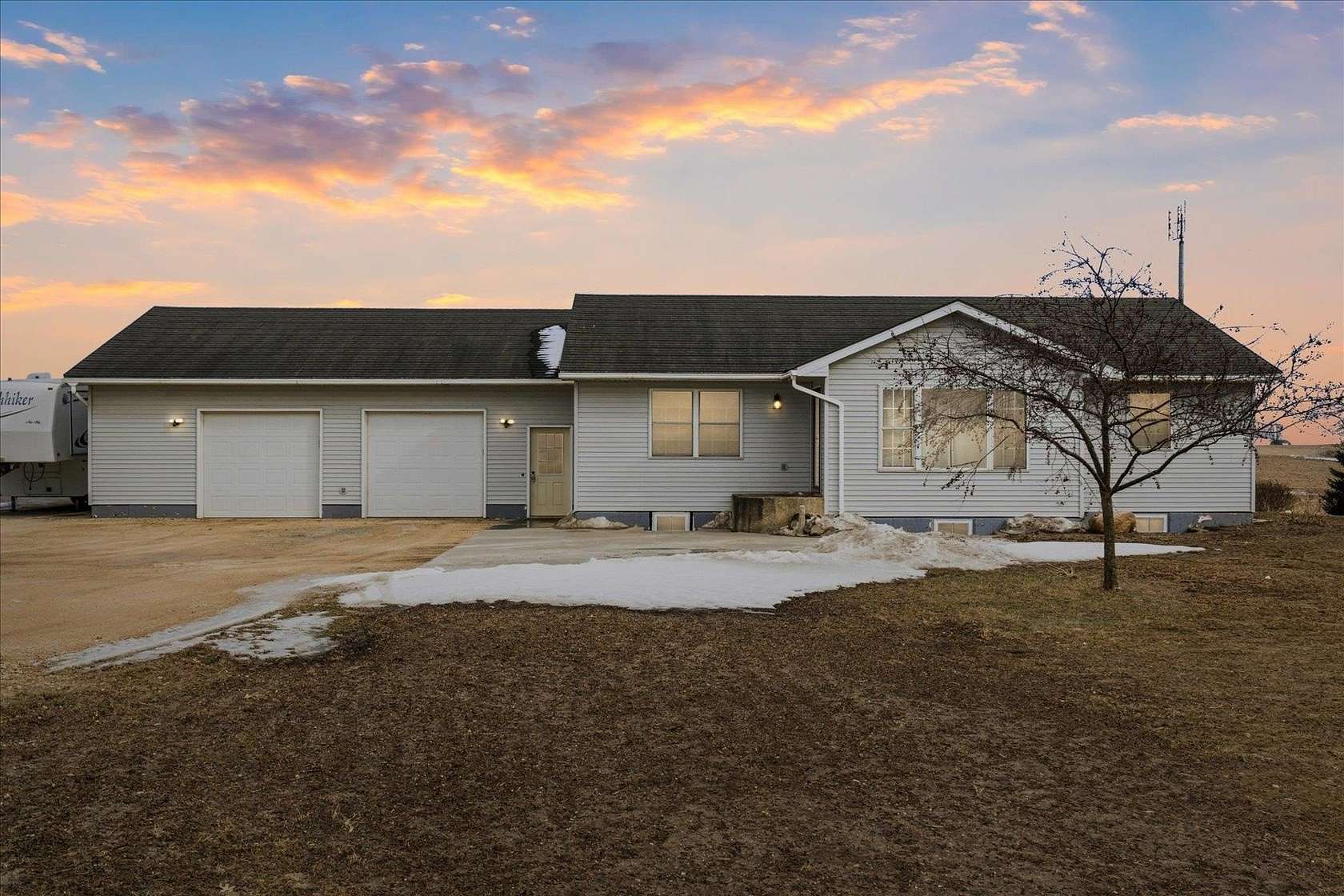 1.63 Acres of Residential Land with Home for Sale in Edgewood, Iowa