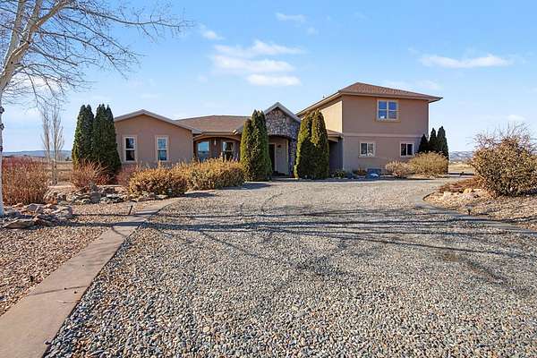 1.74 Acres of Residential Land with Home for Sale in Grand Junction, Colorado