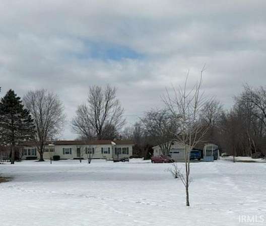 6.7 Acres of Residential Land with Home for Sale in Auburn, Indiana