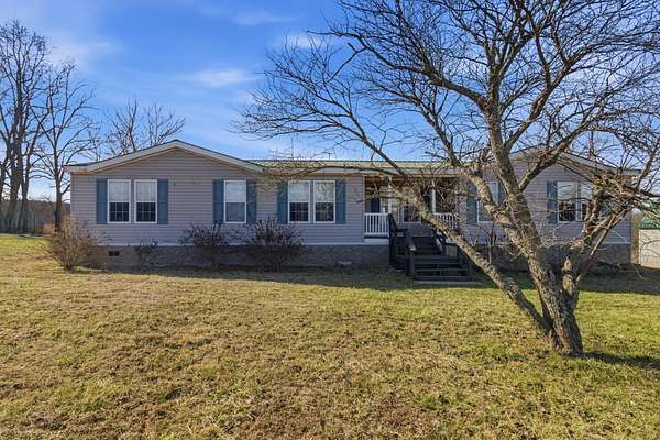 5.9 Acres of Residential Land with Home for Sale in Willow Springs, Missouri