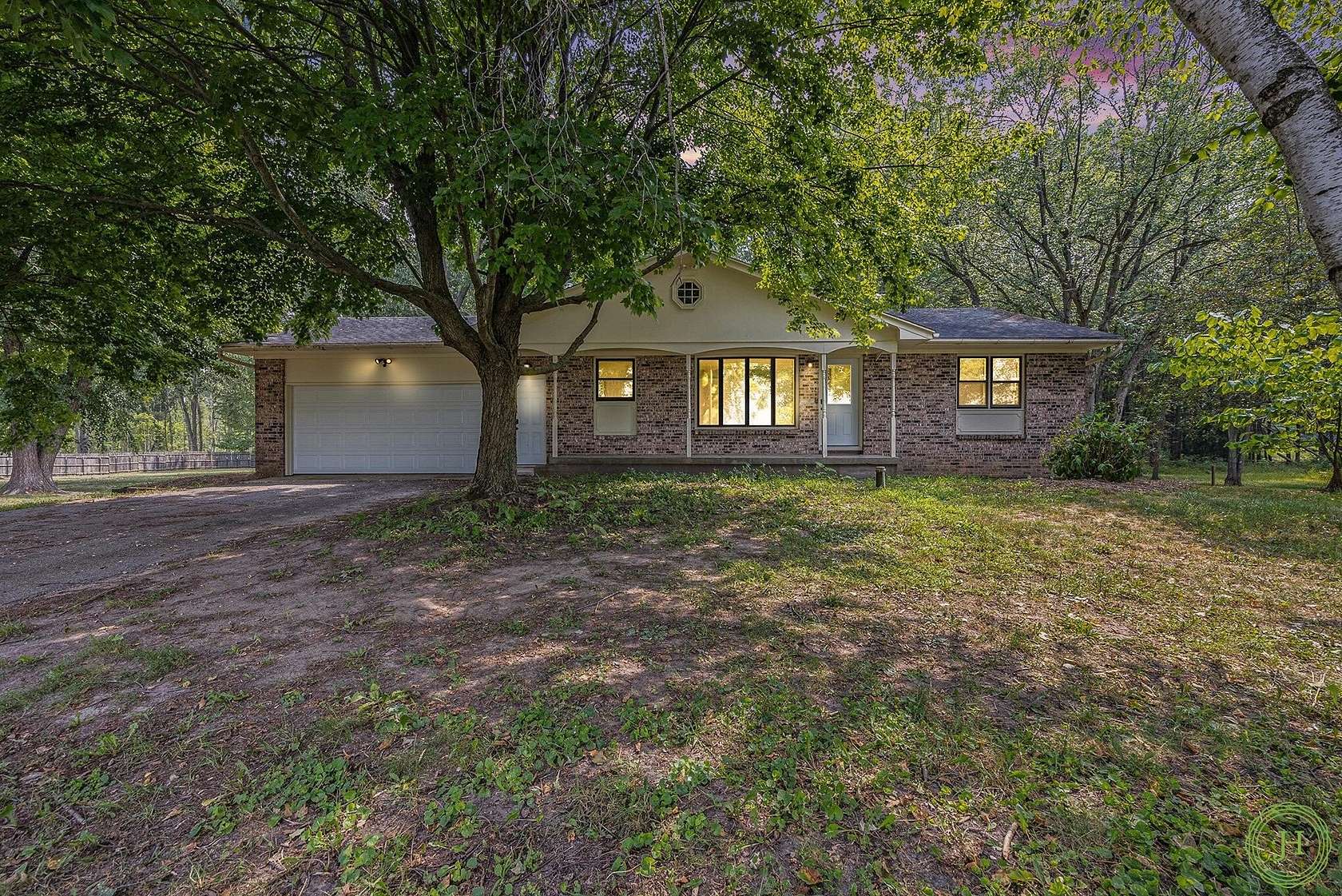 4 Acres of Residential Land with Home for Sale in Rockford, Michigan