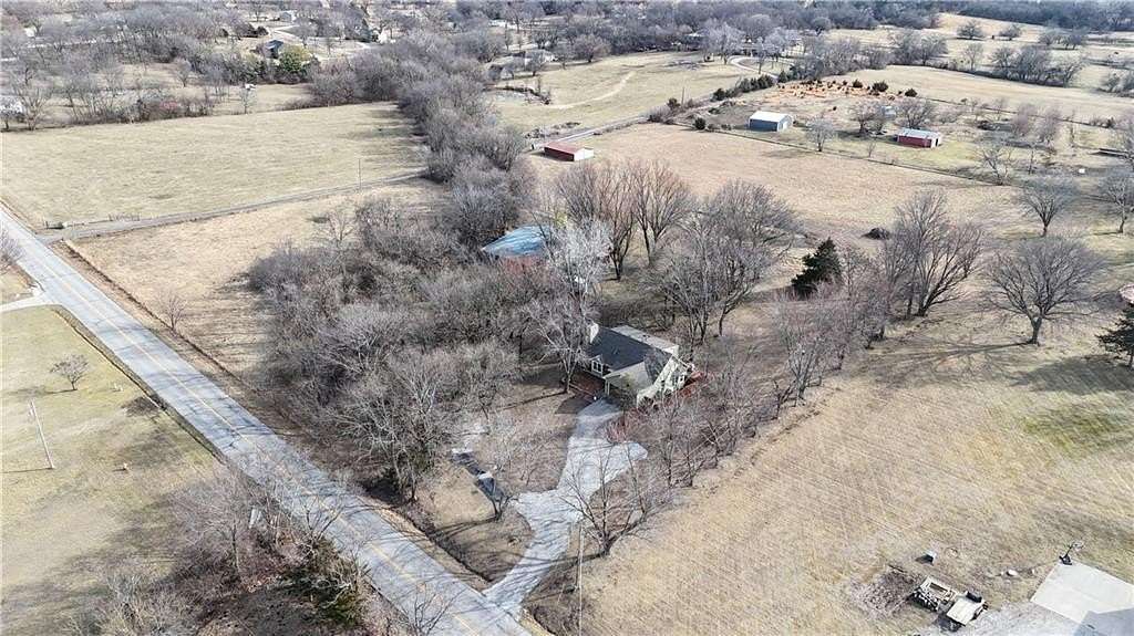 3.79 Acres of Land with Home for Sale in Raymore, Missouri