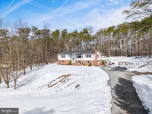 1.6 Acres of Land with Home for Sale in Berkeley Springs, West Virginia