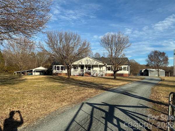 7.1 Acres of Land with Home for Sale in Midland, North Carolina