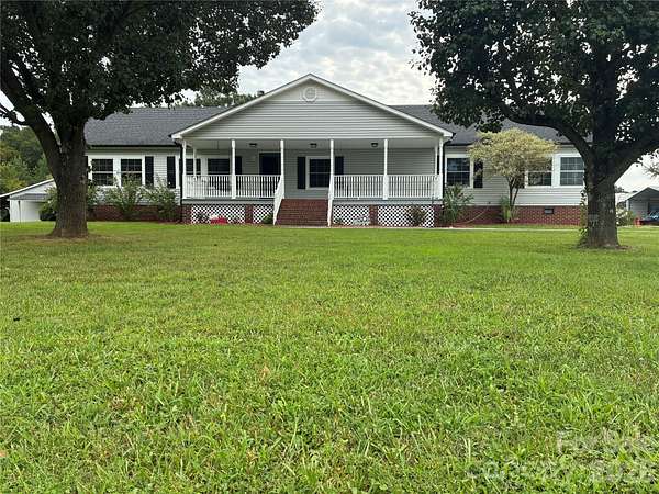 7.1 Acres of Land with Home for Sale in Midland, North Carolina
