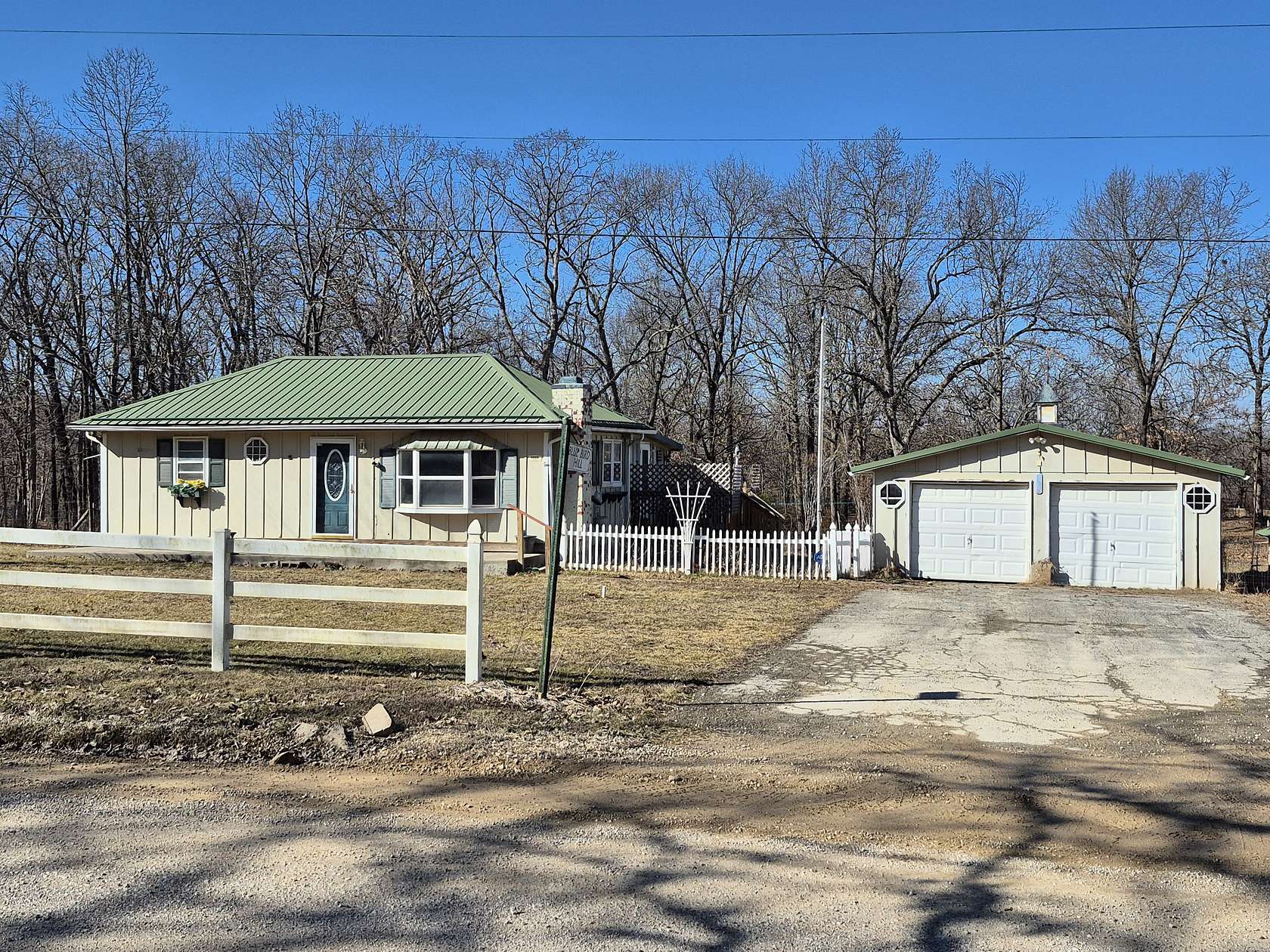 4.45 Acres of Land with Home for Sale in Versailles, Missouri