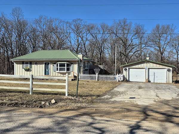 4.45 Acres of Land with Home for Sale in Versailles, Missouri