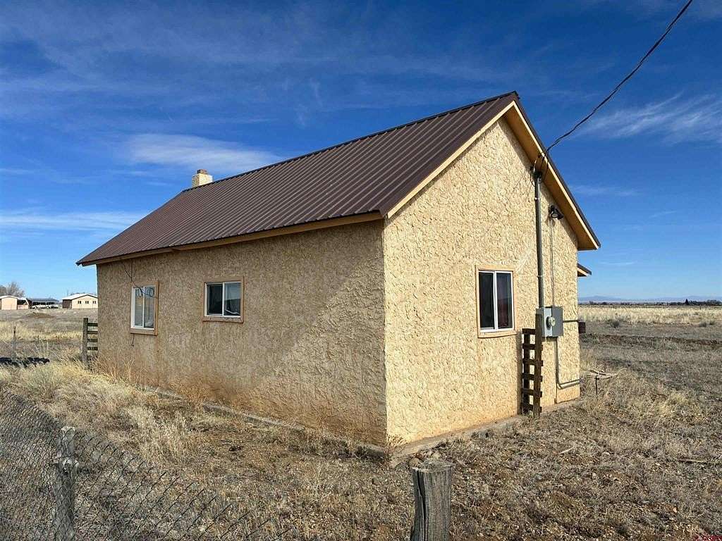 12 Acres of Land with Home for Sale in Capulin, Colorado