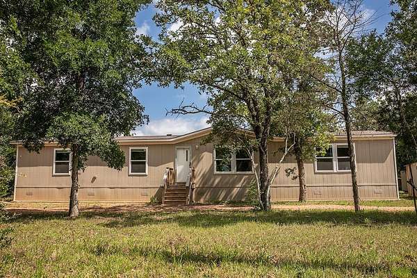 2.5 Acres of Land with Home for Sale in Carmine, Texas