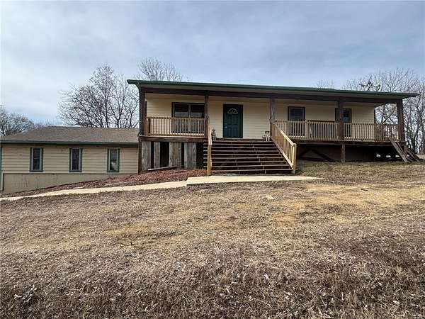 7 Acres of Residential Land with Home for Sale in Paola, Kansas