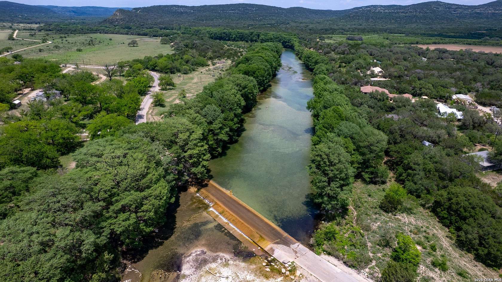 3.15 Acres of Residential Land with Home for Sale in Concan, Texas