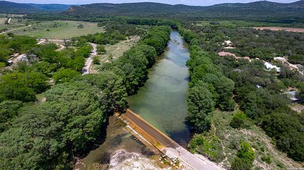 3.15 Acres of Residential Land with Home for Sale in Concan, Texas