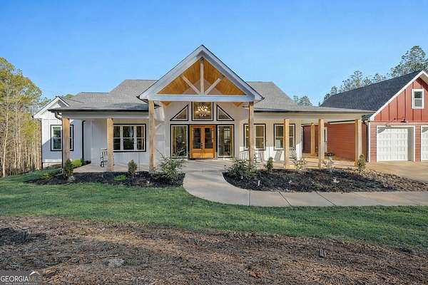 12 Acres of Land with Home for Sale in Ball Ground, Georgia