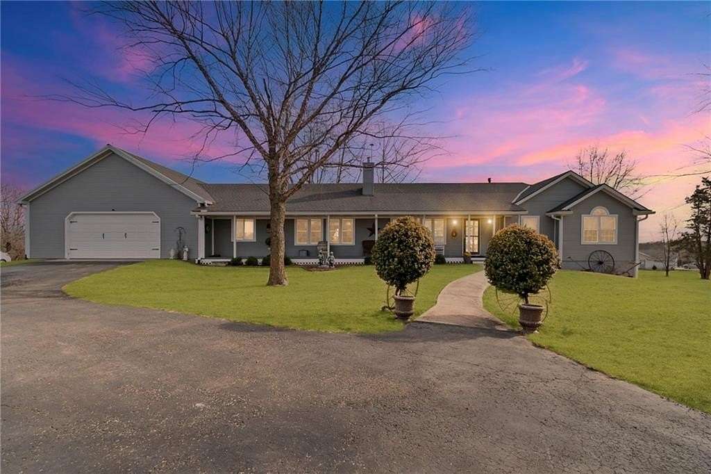 4.48 Acres of Residential Land with Home for Sale in Cameron, Missouri