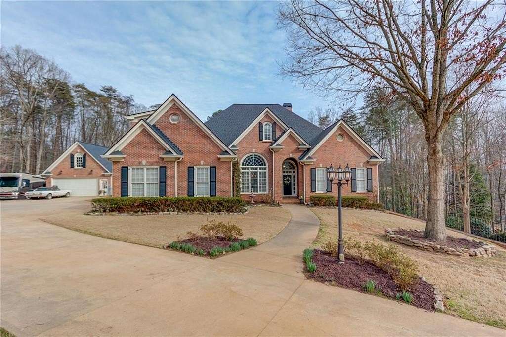 1.64 Acres of Residential Land with Home for Sale in Cumming, Georgia