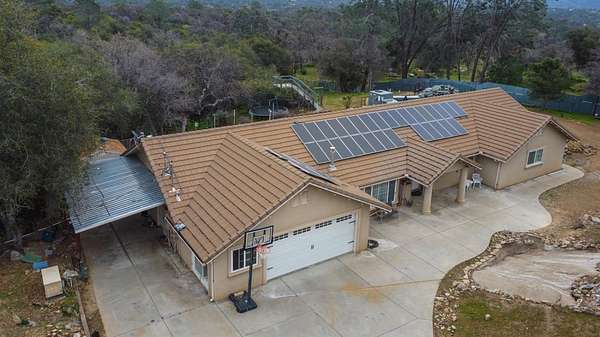 5 Acres of Land with Home for Sale in Auberry, California