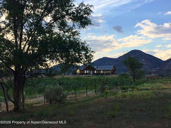 20.8 Acres of Agricultural Land with Home for Sale in Rifle, Colorado