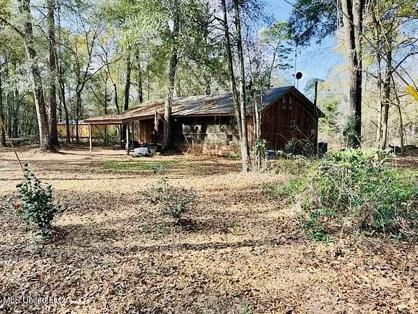 1.57 Acres of Residential Land with Home for Sale in Moselle, Mississippi