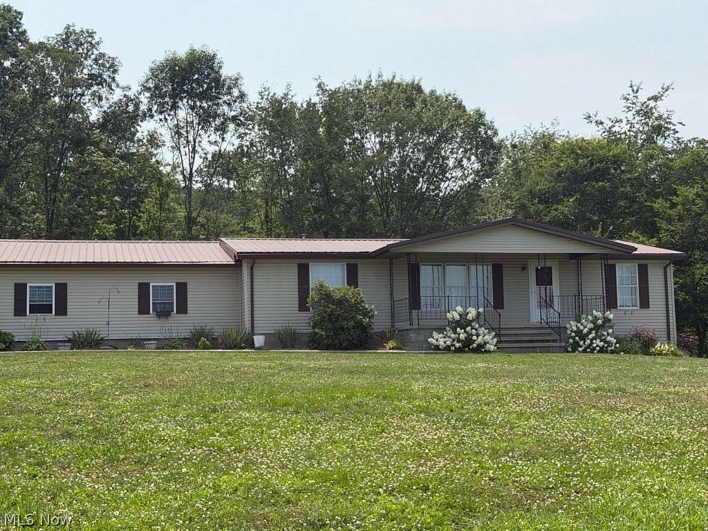 11.5 Acres of Recreational Land with Home for Sale in Carrollton, Ohio