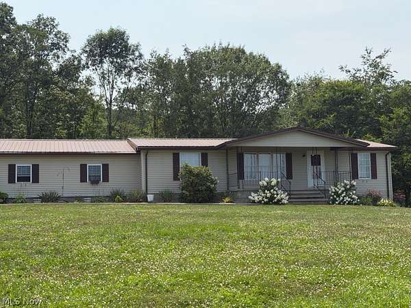 11.5 Acres of Recreational Land with Home for Sale in Carrollton, Ohio