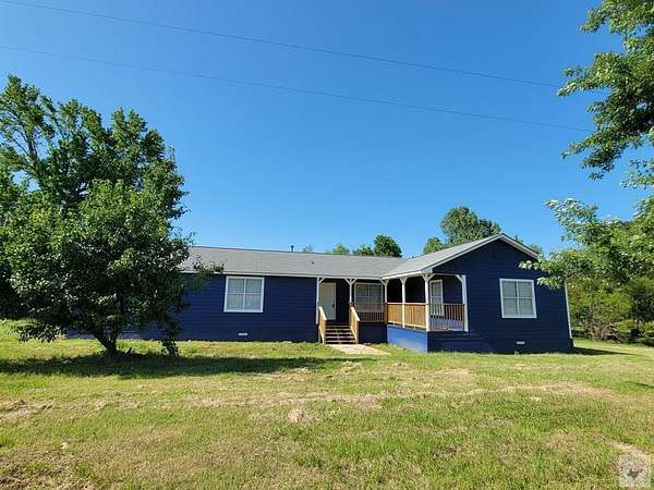 2 Acres of Land with Home for Sale in De Kalb, Texas