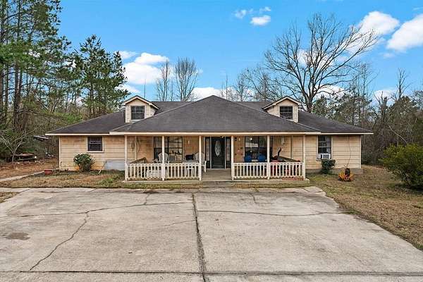 37.8 Acres of Agricultural Land with Home for Sale in Timpson, Texas