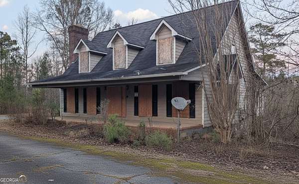 4 Acres of Residential Land with Home for Sale in Locust Grove, Georgia