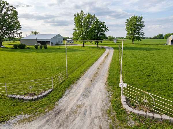 9.77 Acres of Land with Home for Sale in Fordland, Missouri