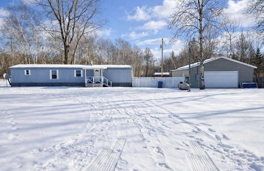 16 Acres of Recreational Land with Home for Sale in Coleman, Michigan
