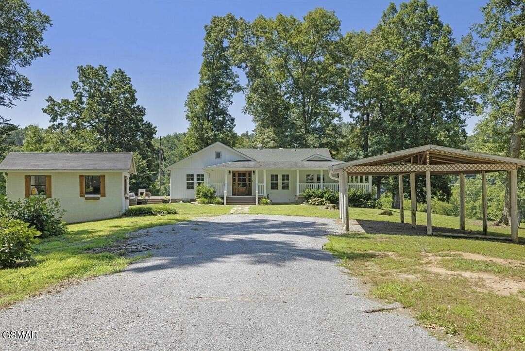 6.35 Acres of Residential Land with Home for Sale in Sevierville, Tennessee