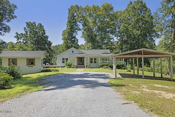 6.35 Acres of Residential Land with Home for Sale in Sevierville, Tennessee