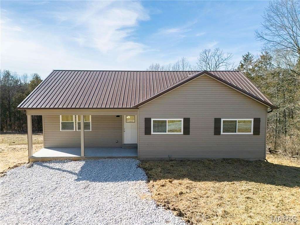 1.56 Acres of Residential Land with Home for Sale in Hillsboro, Missouri