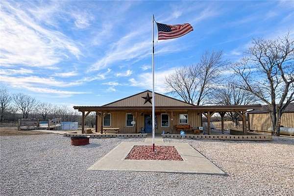 11 Acres of Recreational Land with Home for Sale in Chilhowee, Missouri