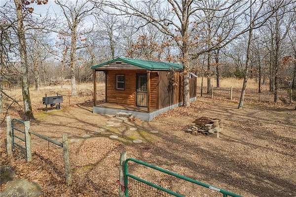 185 Acres of Recreational Land with Home for Sale in Vian, Oklahoma