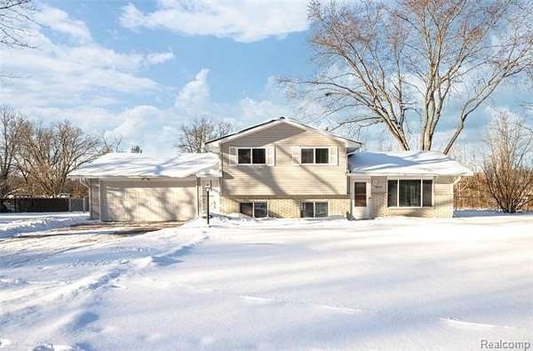 2.45 Acres of Residential Land with Home for Sale in Clarkston, Michigan