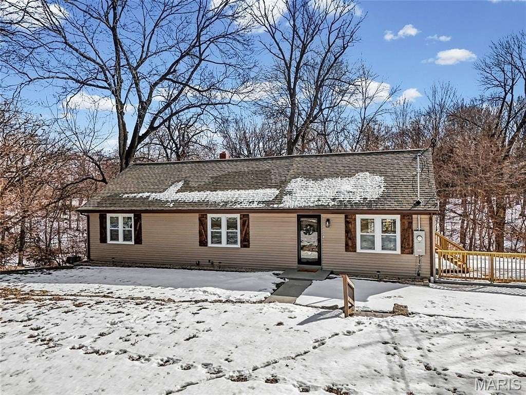 3.29 Acres of Residential Land with Home for Sale in Maryland Heights, Missouri