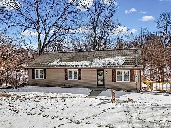 3.29 Acres of Residential Land with Home for Sale in Maryland Heights, Missouri