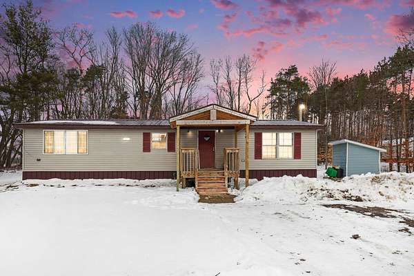 1.52 Acres of Residential Land with Home for Sale in Sand Lake, Michigan