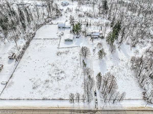 5.55 Acres of Residential Land with Home for Sale in Chesterland, Ohio