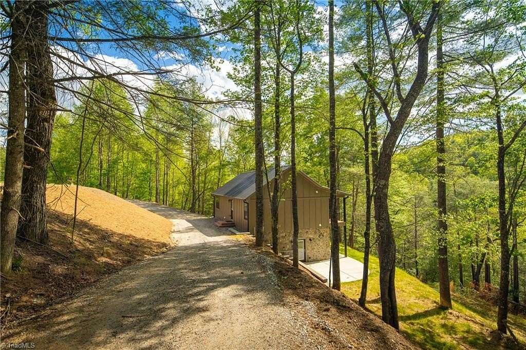 2.18 Acres of Land with Home for Sale in Purlear, North Carolina