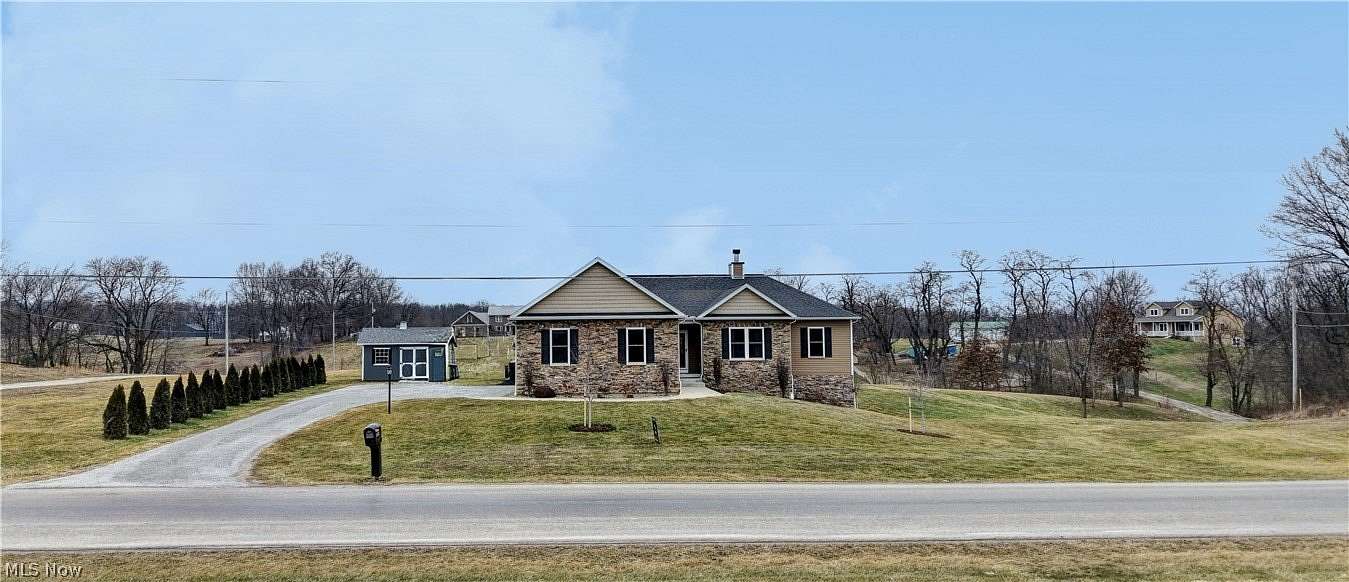 1.56 Acres of Land with Home for Sale in Orrville, Ohio